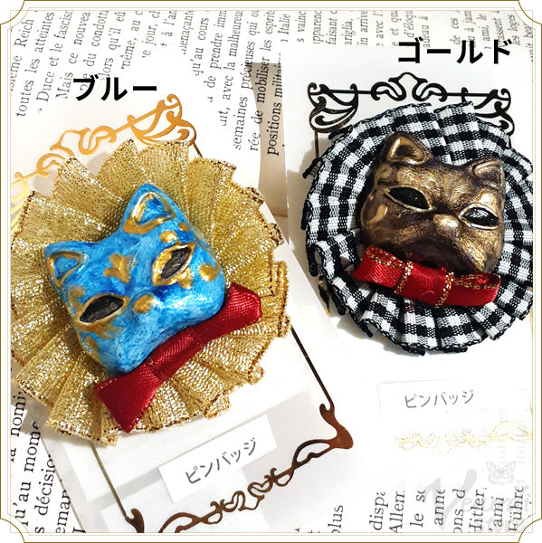 ネコ面ピンバッジ