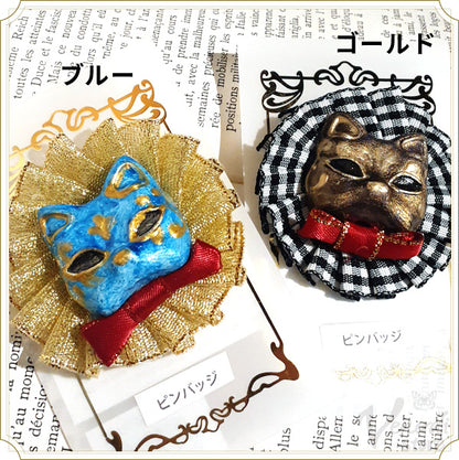 ネコ面ピンバッジ