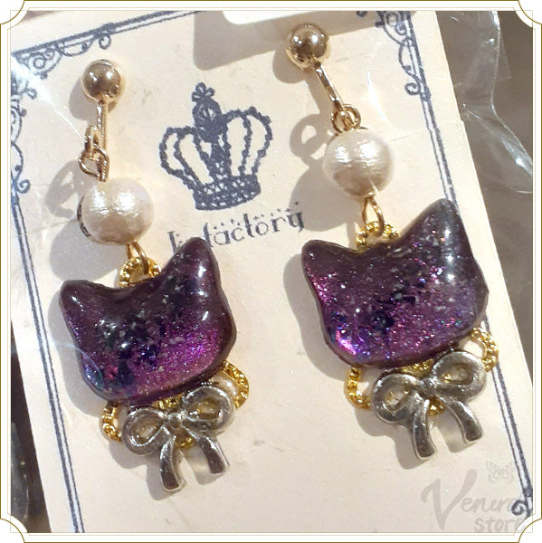 宙色猫の耳飾り（イヤリング・ピアス・猫・肉球）