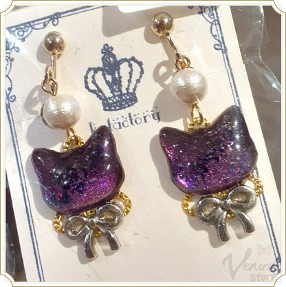 宙色猫の耳飾り（イヤリング・ピアス・猫・肉球）